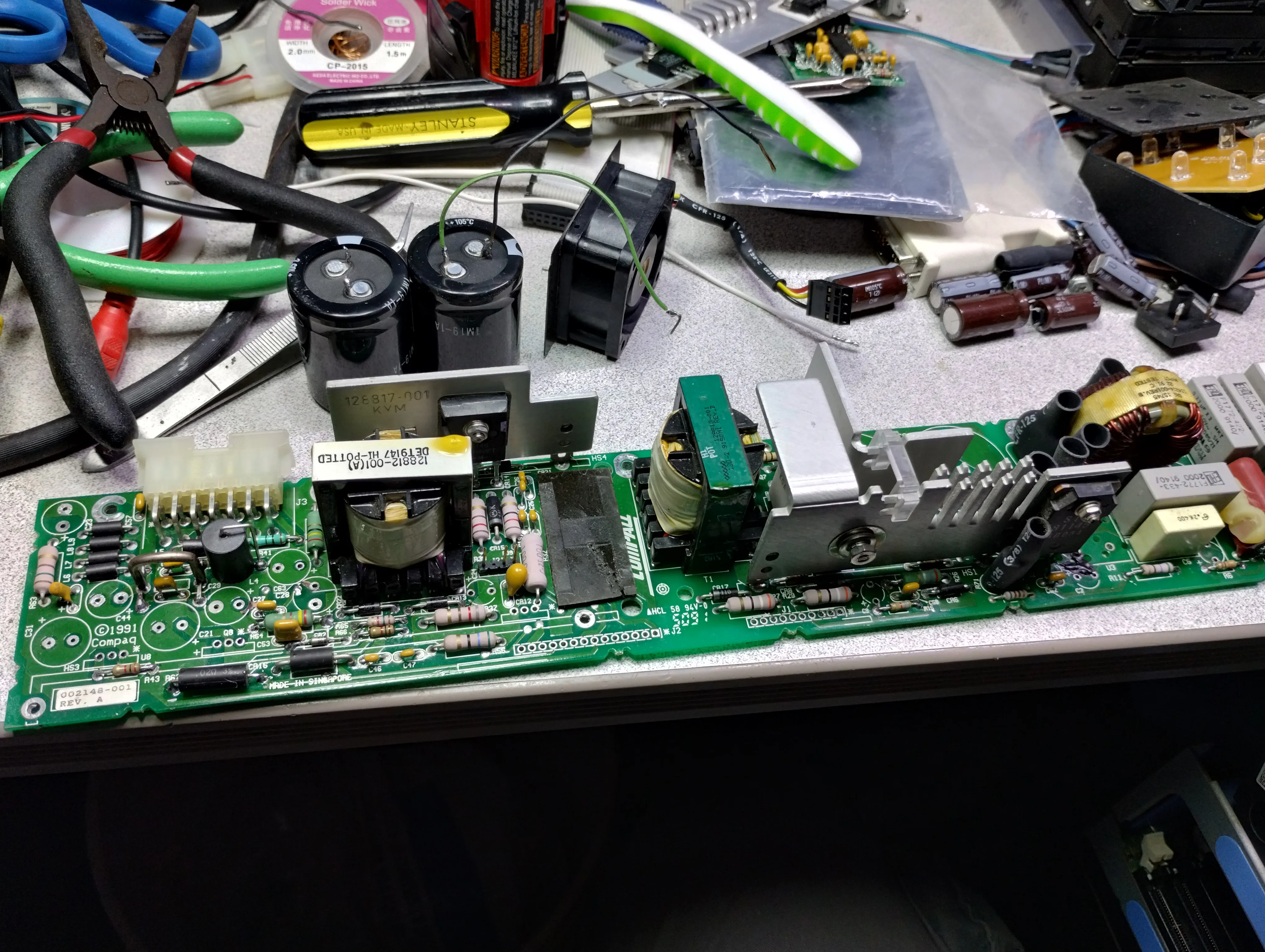 PSU board removed and recapped on the workbench