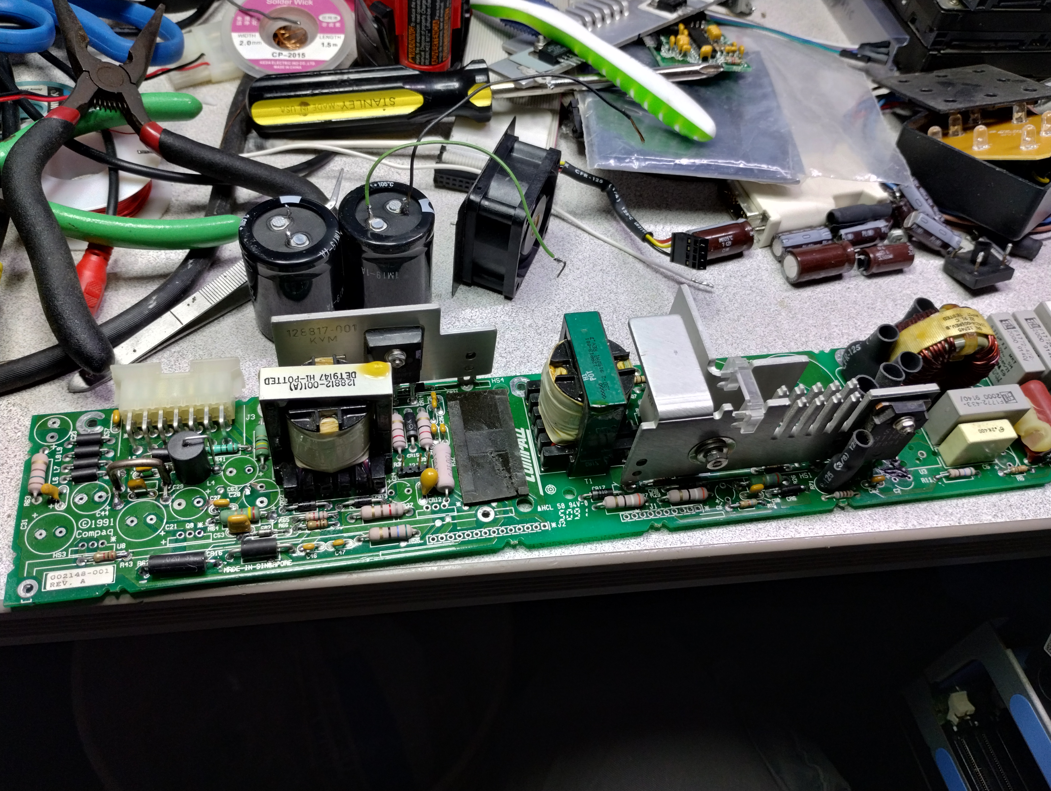 PSU board removed and recapped on the workbench
